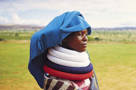 Batwane Woman in Traditional Dress