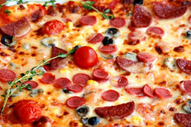 Tuck into a Prouds Pizza