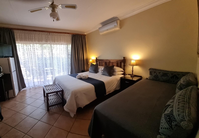 Deluxe Triple Room with Private Patio 