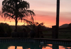 Sunset over pool