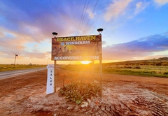 Entrance sign by the road