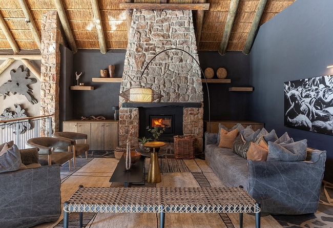 Lounge with fireplace and big screen TV