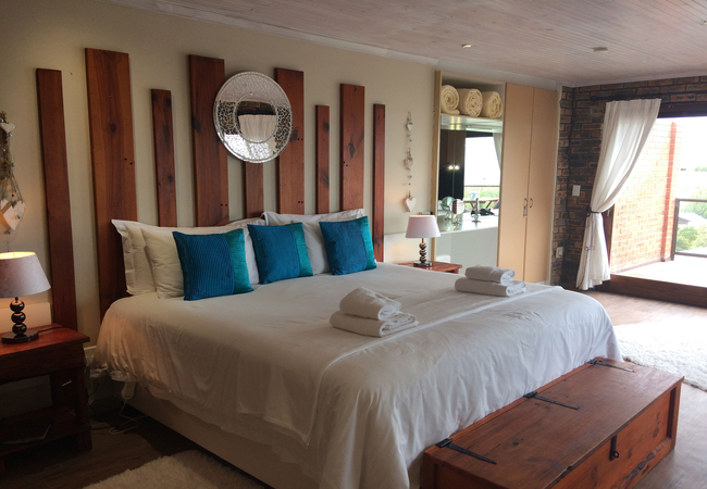 Flamingo\'s Nest Bedroom with ocean view and private deck